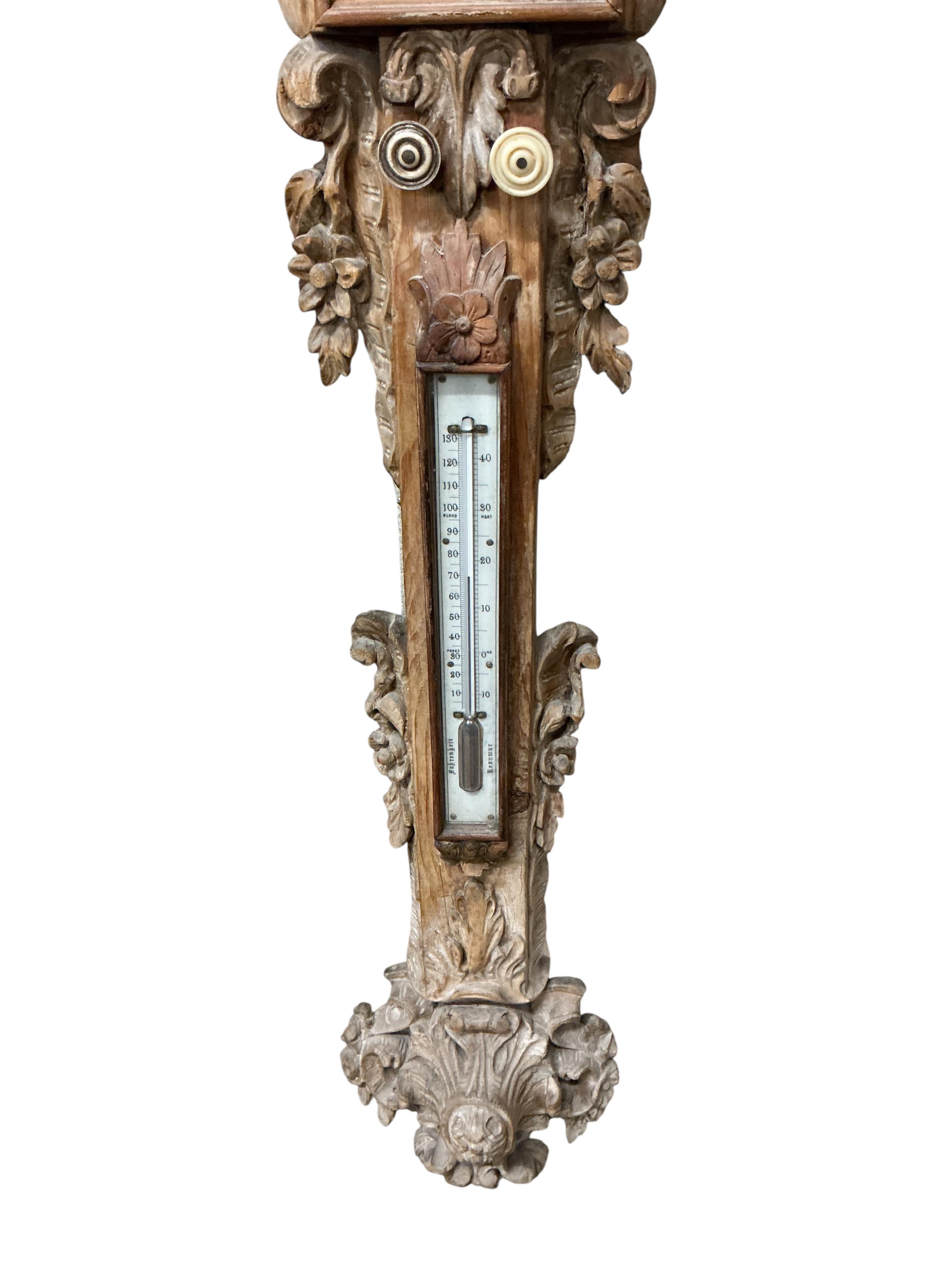 A Victorian elaborately carved pine stick barometer / thermometer by Hepwood of Bridgnorth, height 126cm